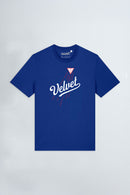 Blue t-shirt with 'Velvet' logo on a light gray background