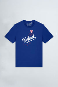 Blue t-shirt with 'Velvet' logo on a light gray background
