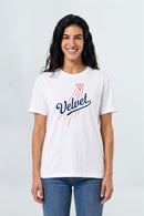Woman wearing a white t-shirt with 'Velvet' design on a plain background