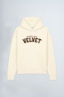 Cream hoodie with 'Velvet' text on a light gray background